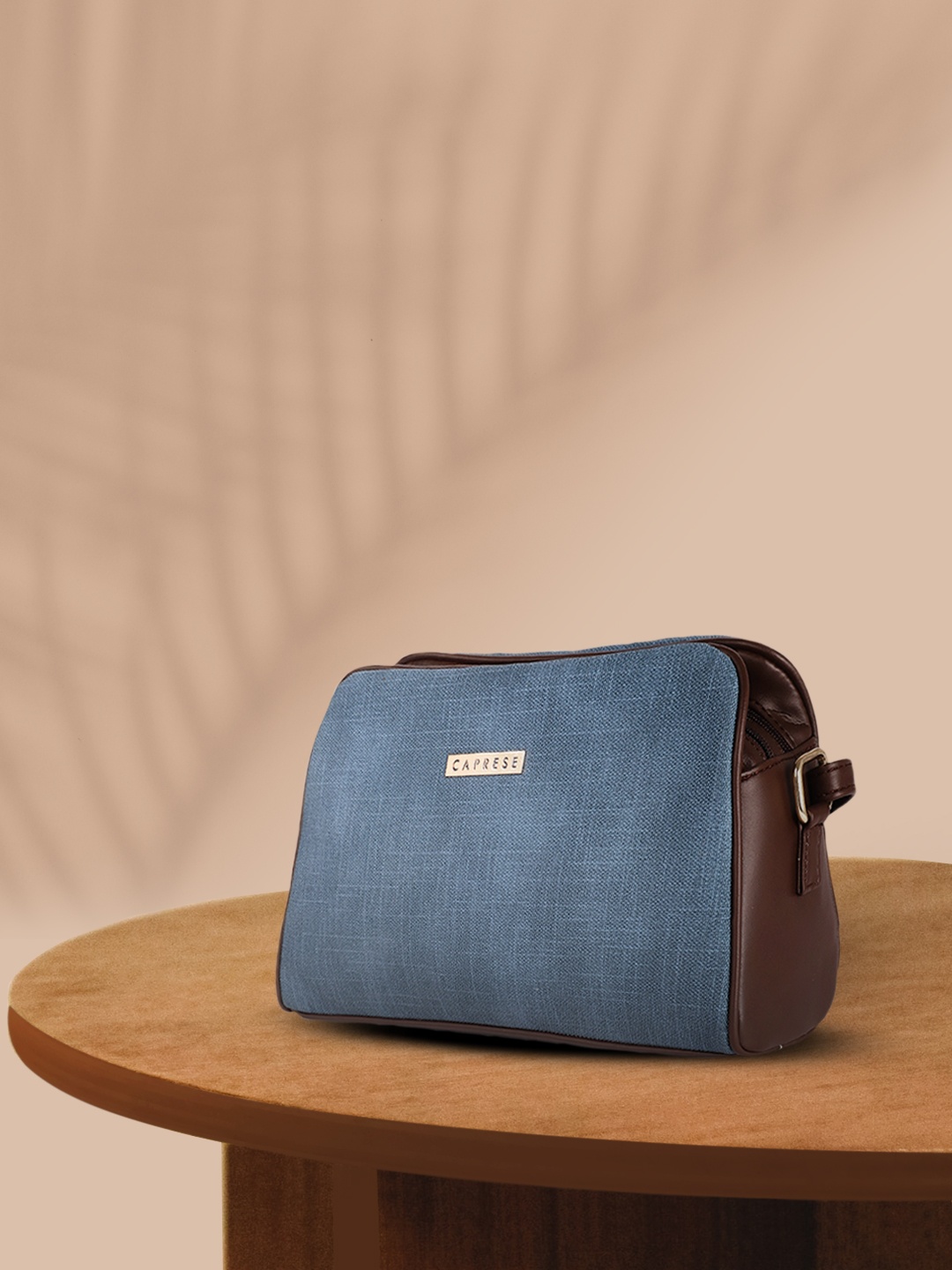 

Caprese Women Blue Structured Sling Bag