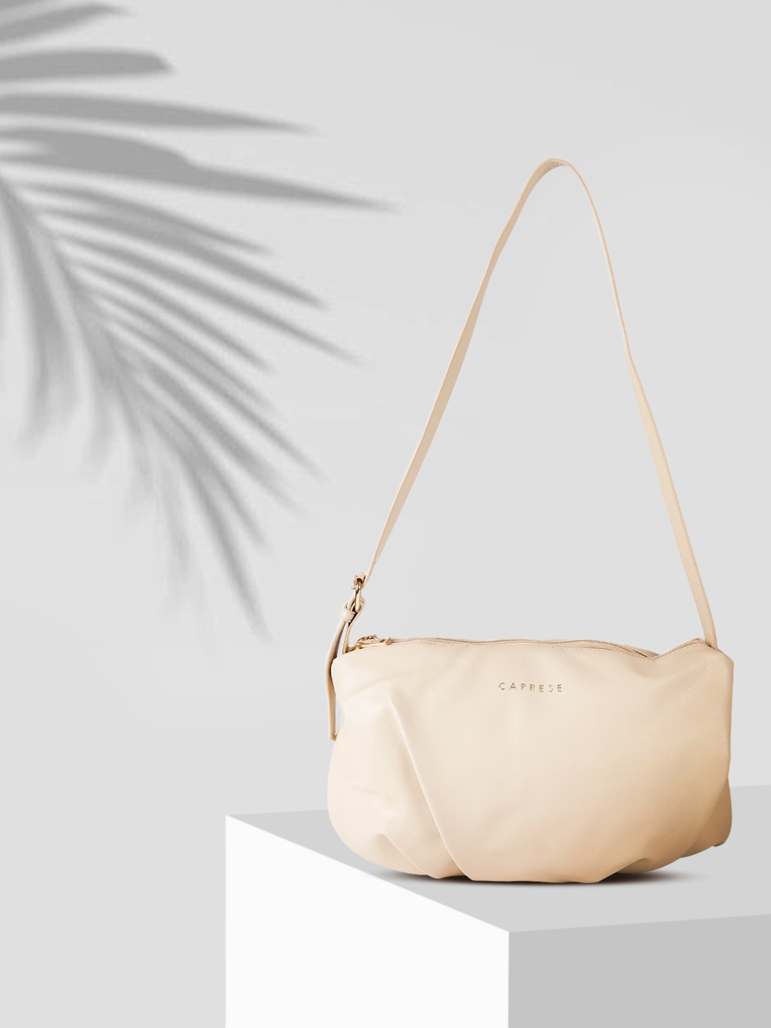 

Caprese Women Beige Structured Shoulder Bag