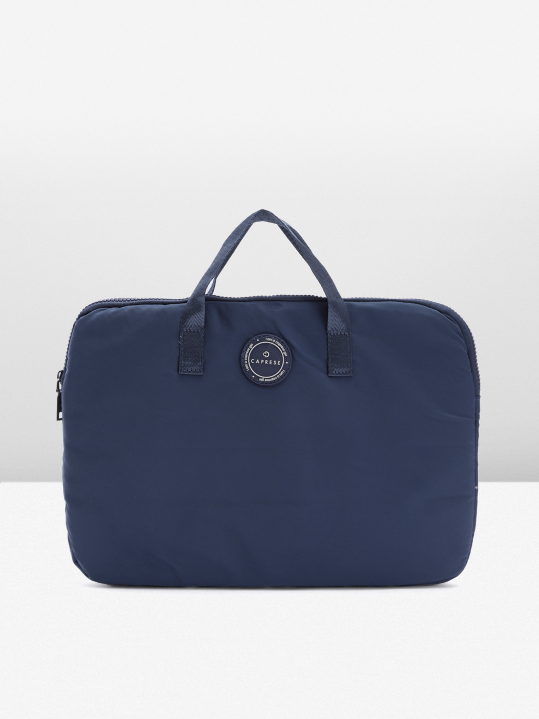 

Caprese Women Solid Laptop Bag, Blue