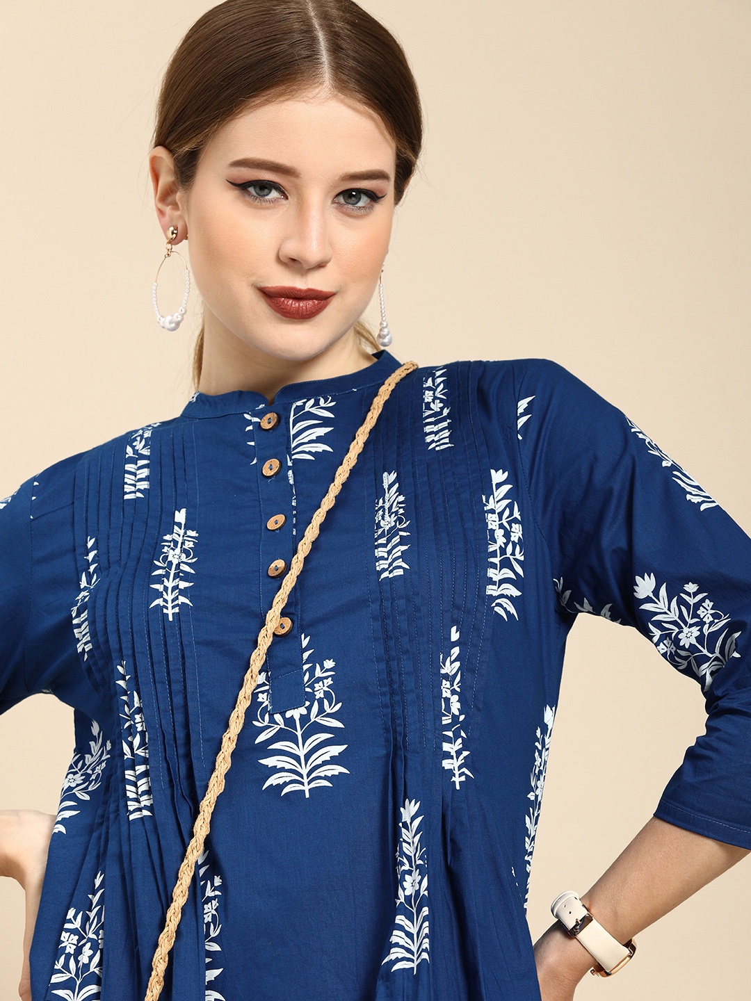 

Anouk Women Navy Blue & White Pure Cotton Ethnic Motifs Printed Pleated Kurti