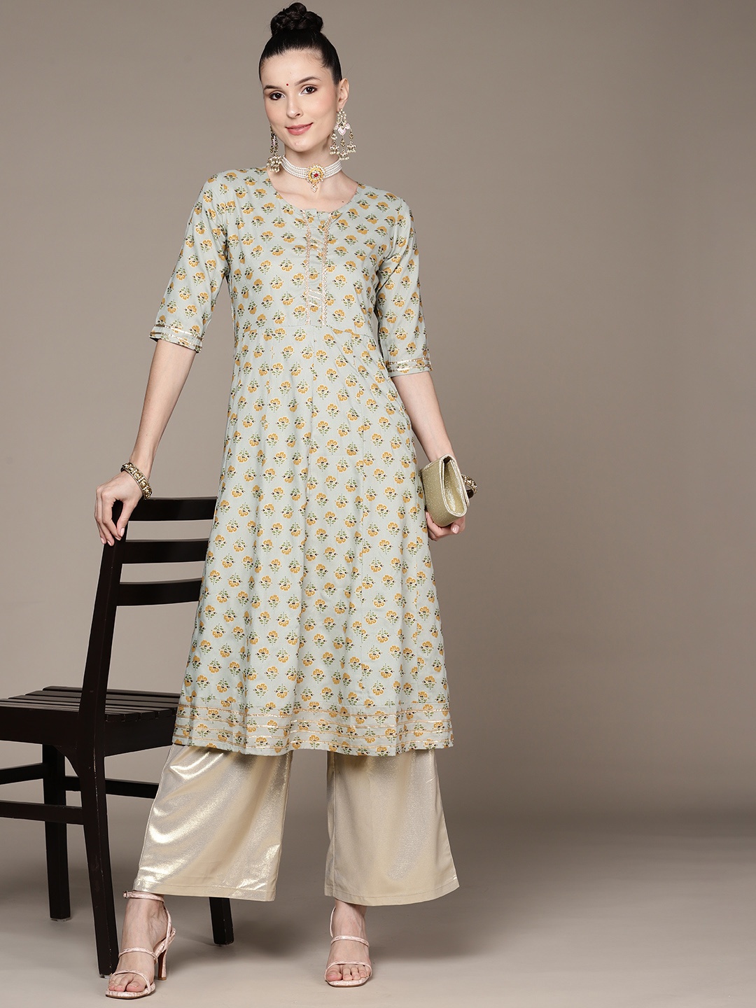 

Anubhutee Women Green Floral Printed Gotta Patti Floral Kurta