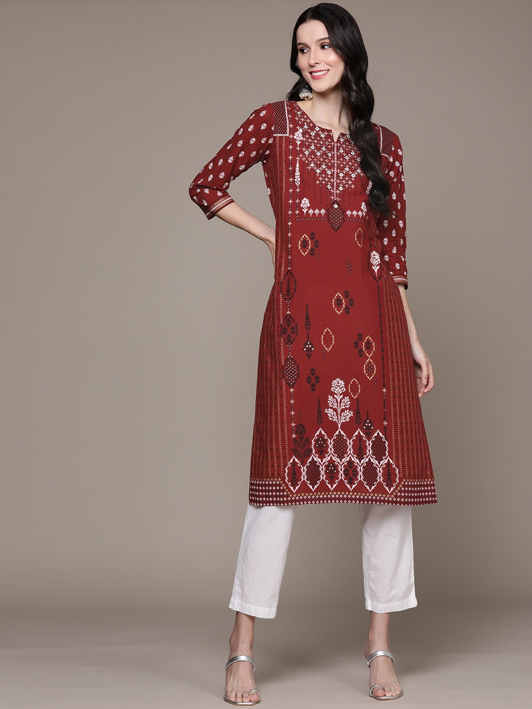 

Anubhutee Women Rust Red Ethnic Motifs Printed Mirror Work Cotton Kurta