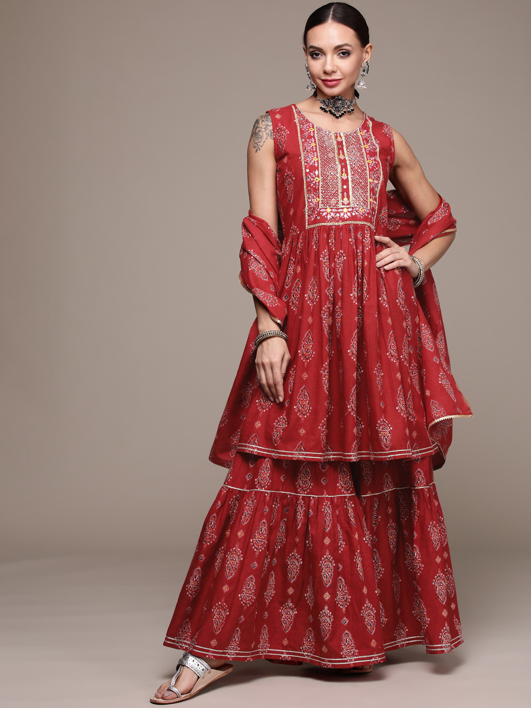 

Anubhutee Women Rust Red Printed Sequinned Pure Cotton Kurta with Sharara & With Dupatta