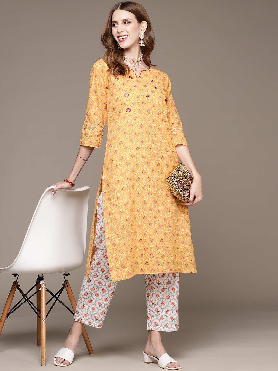 

Anubhutee Women Mustard Yellow Ethnic Motifs Printed Mirror Work Pure Cotton Kurta with Trousers