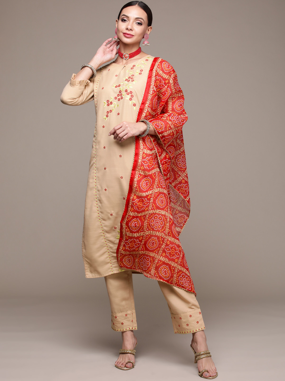 

Anubhutee Women Beige Floral Embroidered Thread Work Kurta with Trousers & With Dupatta