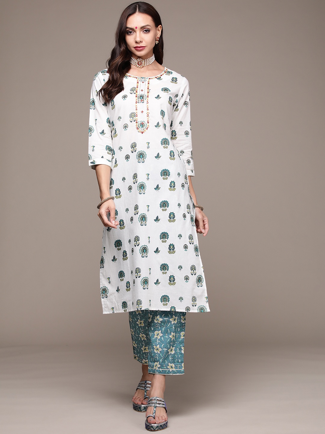 

Anubhutee Women Off White Floral Embroidered Thread Work Pure Cotton Kurta with Trousers