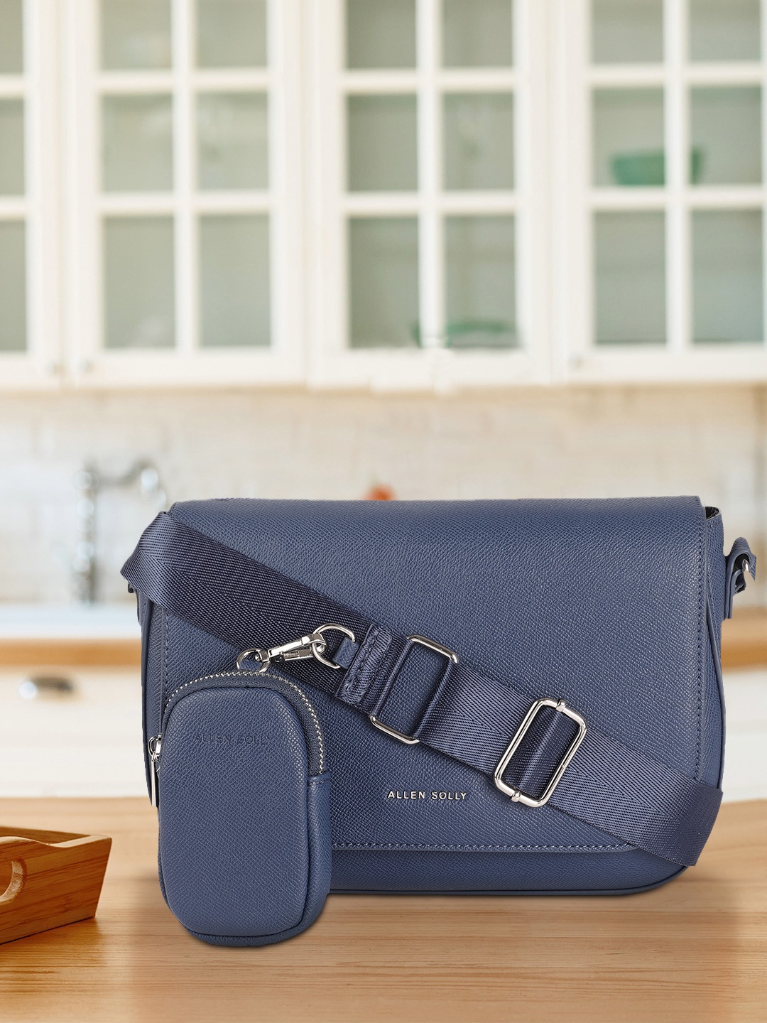 

Allen Solly Navy Blue Solid PU Regular Structured Sling Bag with Pouch