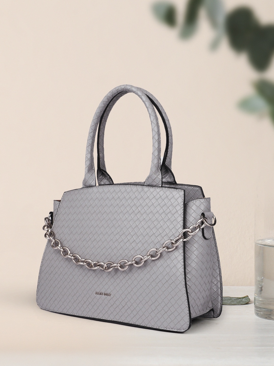 

Allen Solly Grey Quilted Handheld Bag