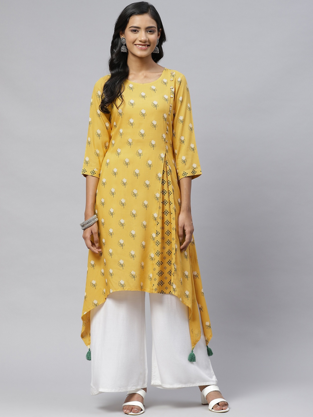 

clorals Women Mustard Yellow & White Ethnic Motifs Printed Asymmetric Liva Kurta
