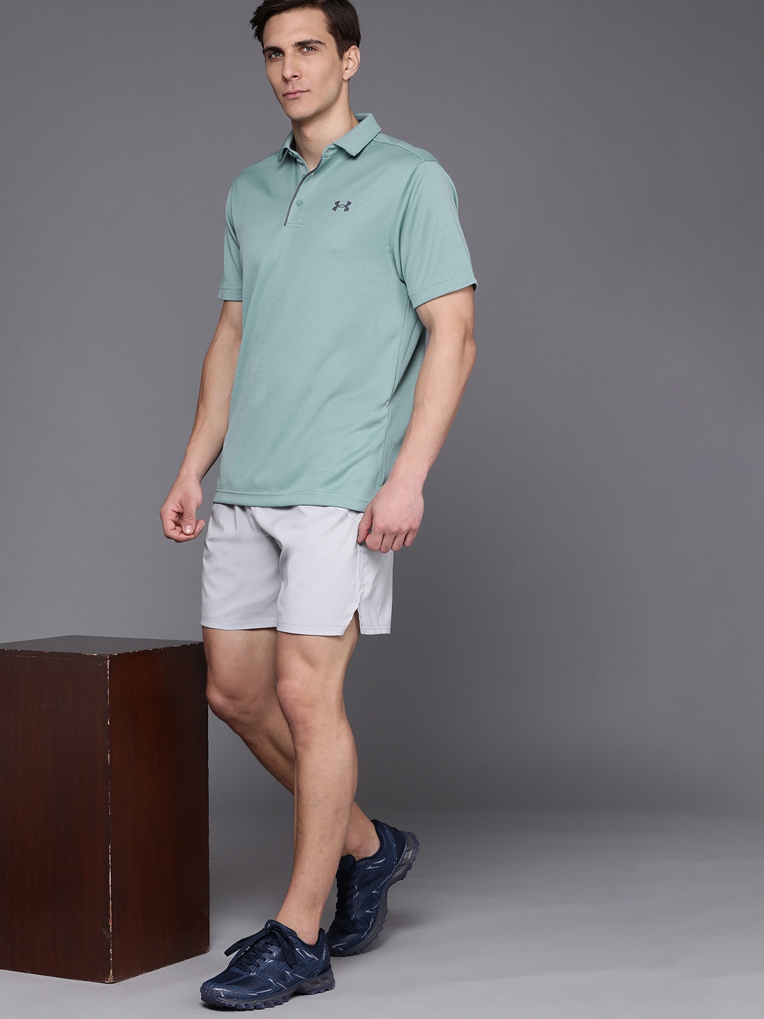 

UNDER ARMOUR Men Green Solid Oversized Fit Tech Polo T-shirt