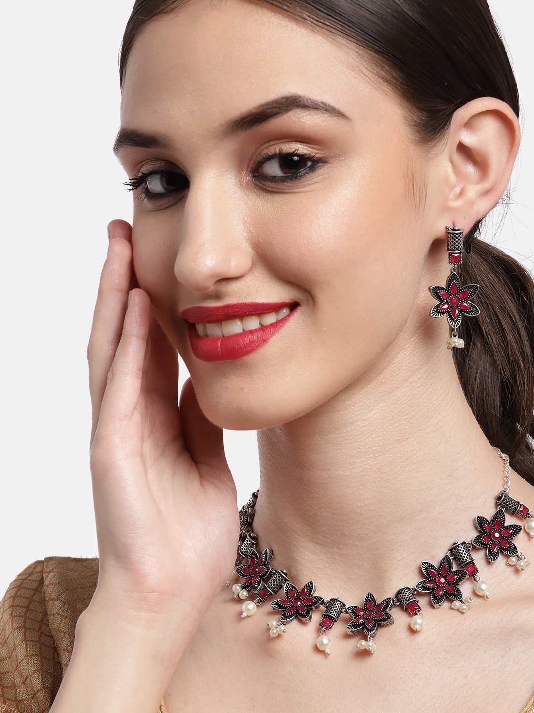 

Ishin Silver-Plated Pink Stone Studded Floral Oxidised Jewellery Set