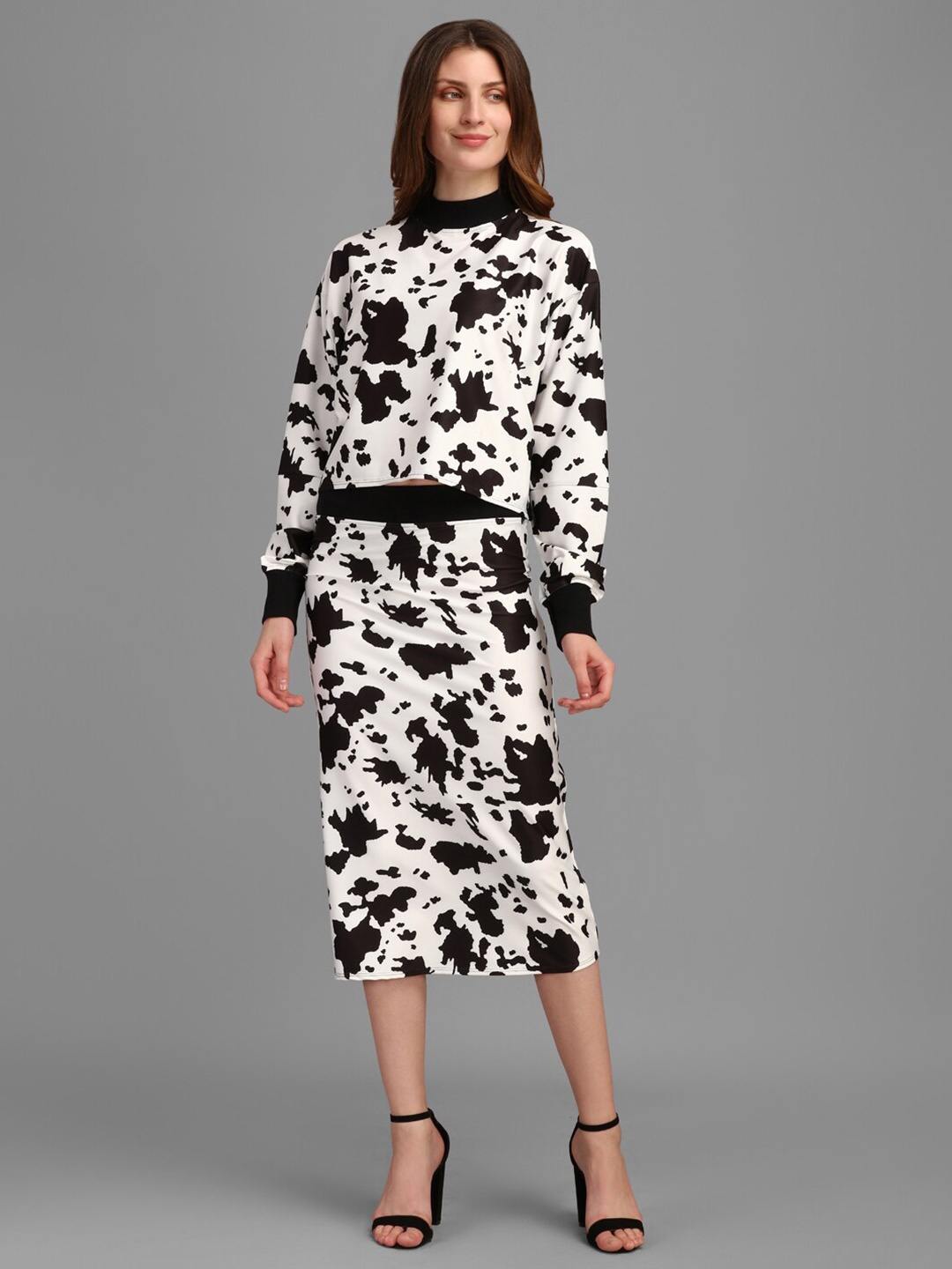 

PURVAJA White & Black Animal Print Top