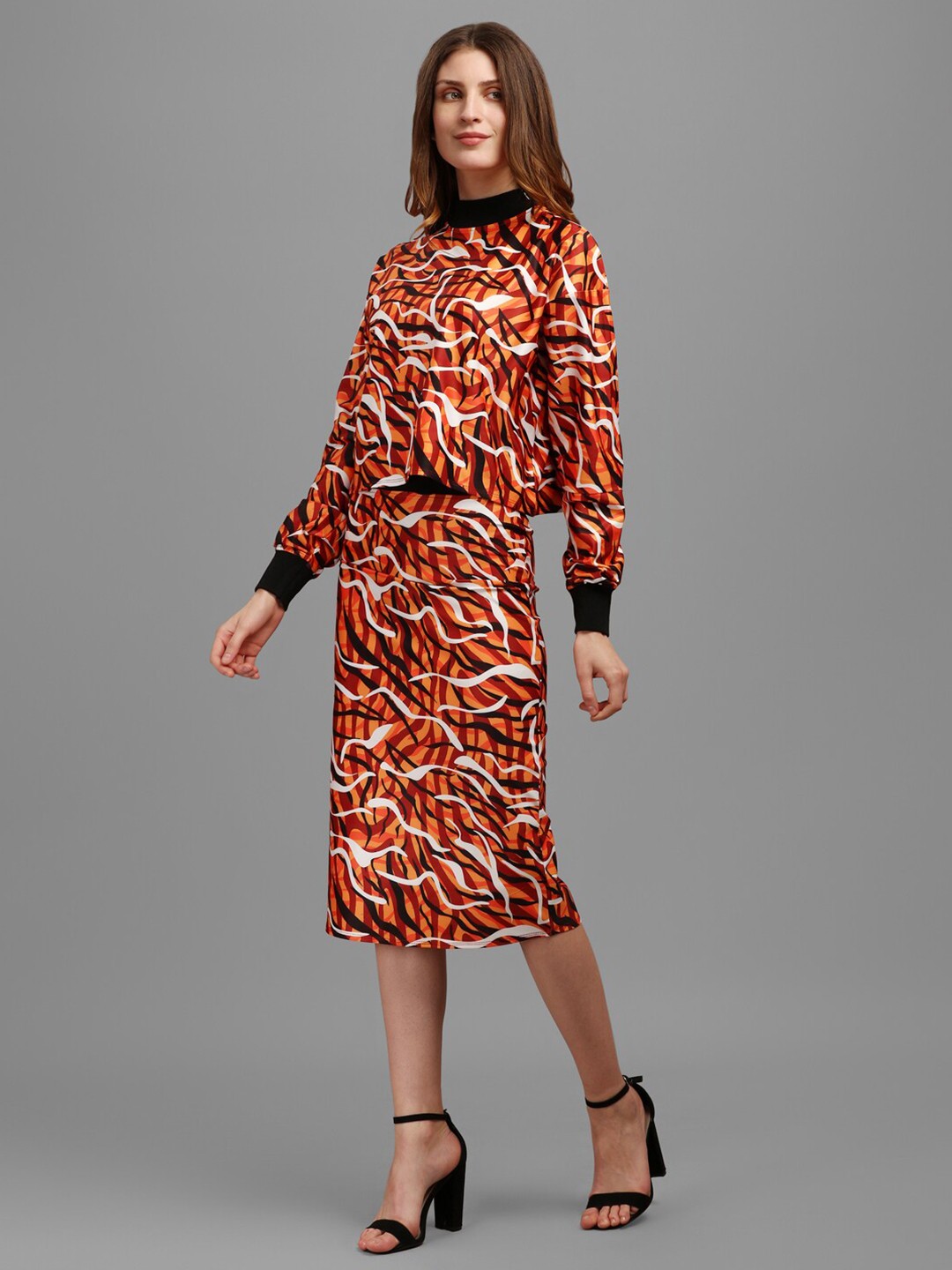 

PURVAJA Orange Animal Print Top