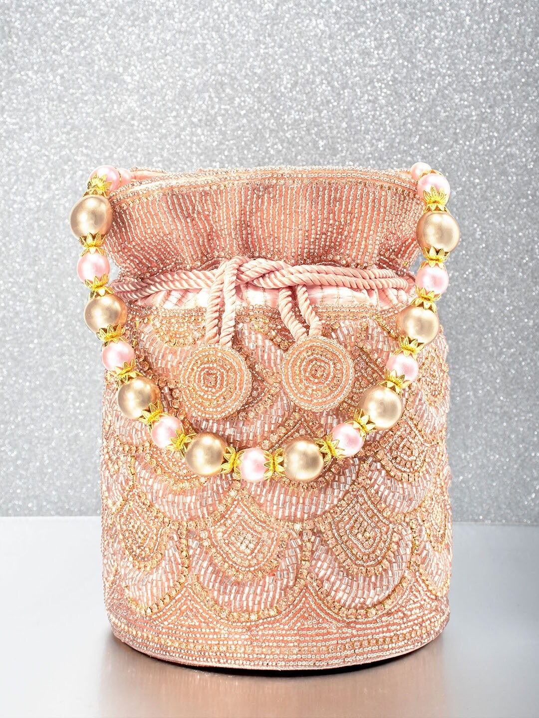 

Peora Rose Gold Embellished Potli Clutch
