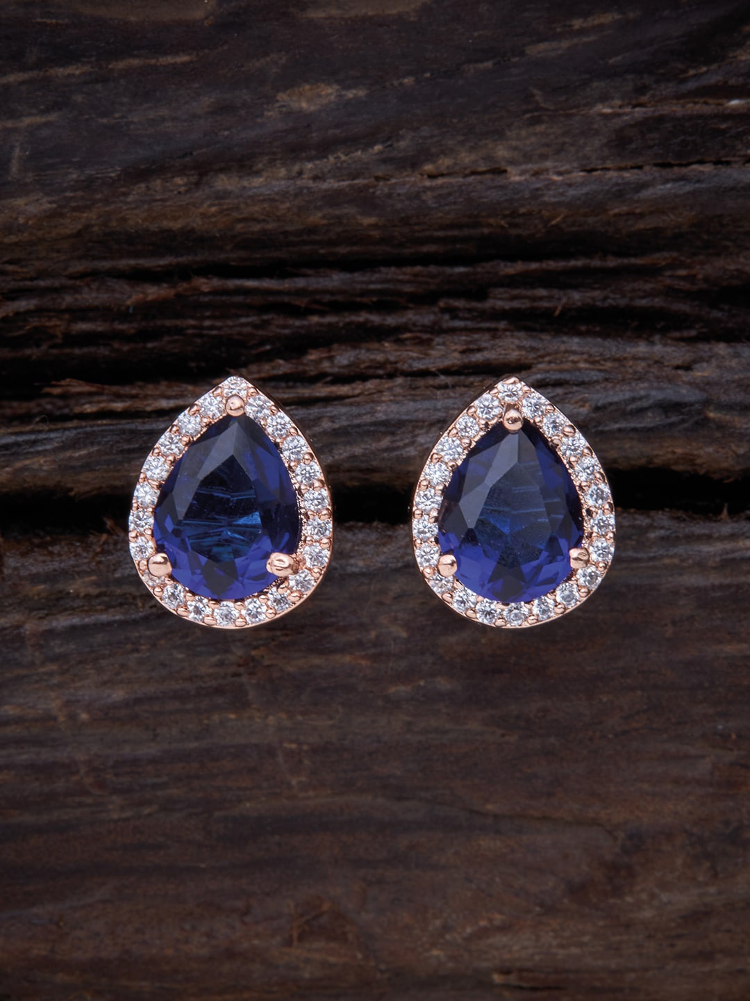 

Kushal's Fashion Jewellery Blue Teardrop Shaped Studs Earrings