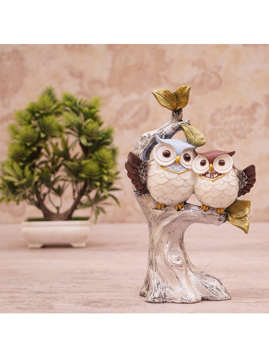 

StatueStudio Blue & White Owl Sitting On Tree Showpiece