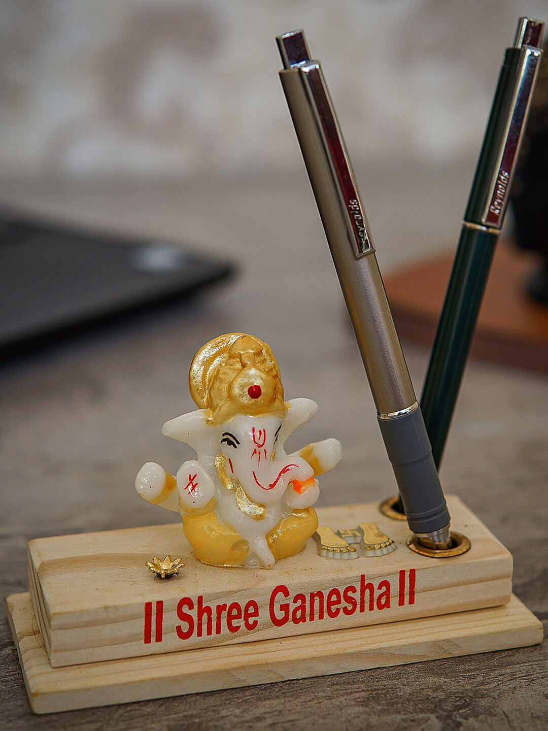 

StatueStudio Gold Ganesha Statue On Wooden Base With Pen Holder Showpiece