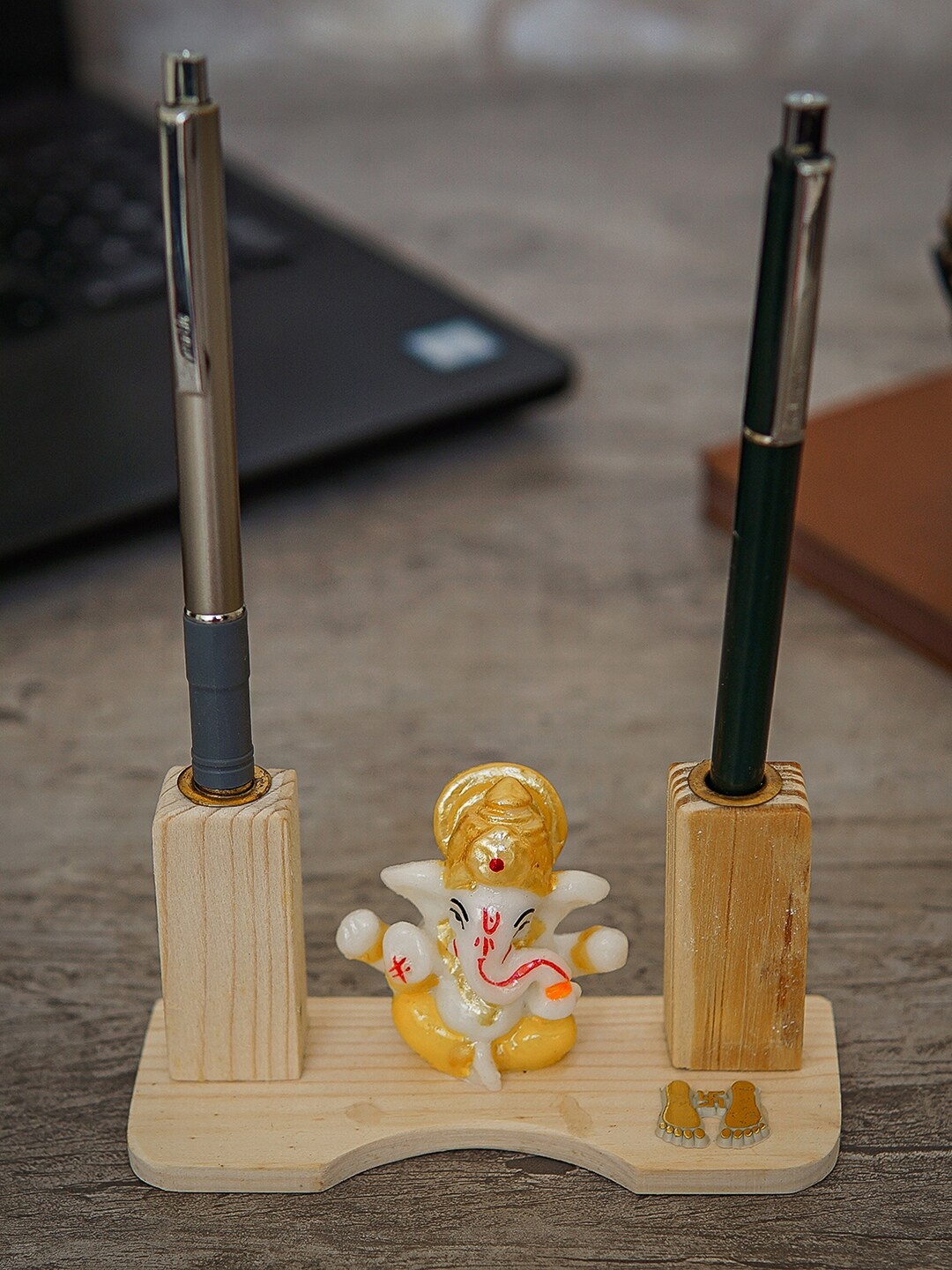 

StatueStudio Gold-Toned & Yellow Ganesha Statue With Pen Holder Showpiece