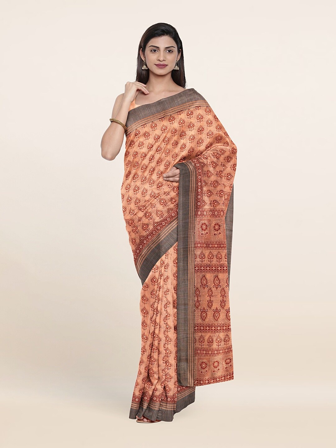

Pothys Peach-Coloured & Red Ethnic Motifs Saree