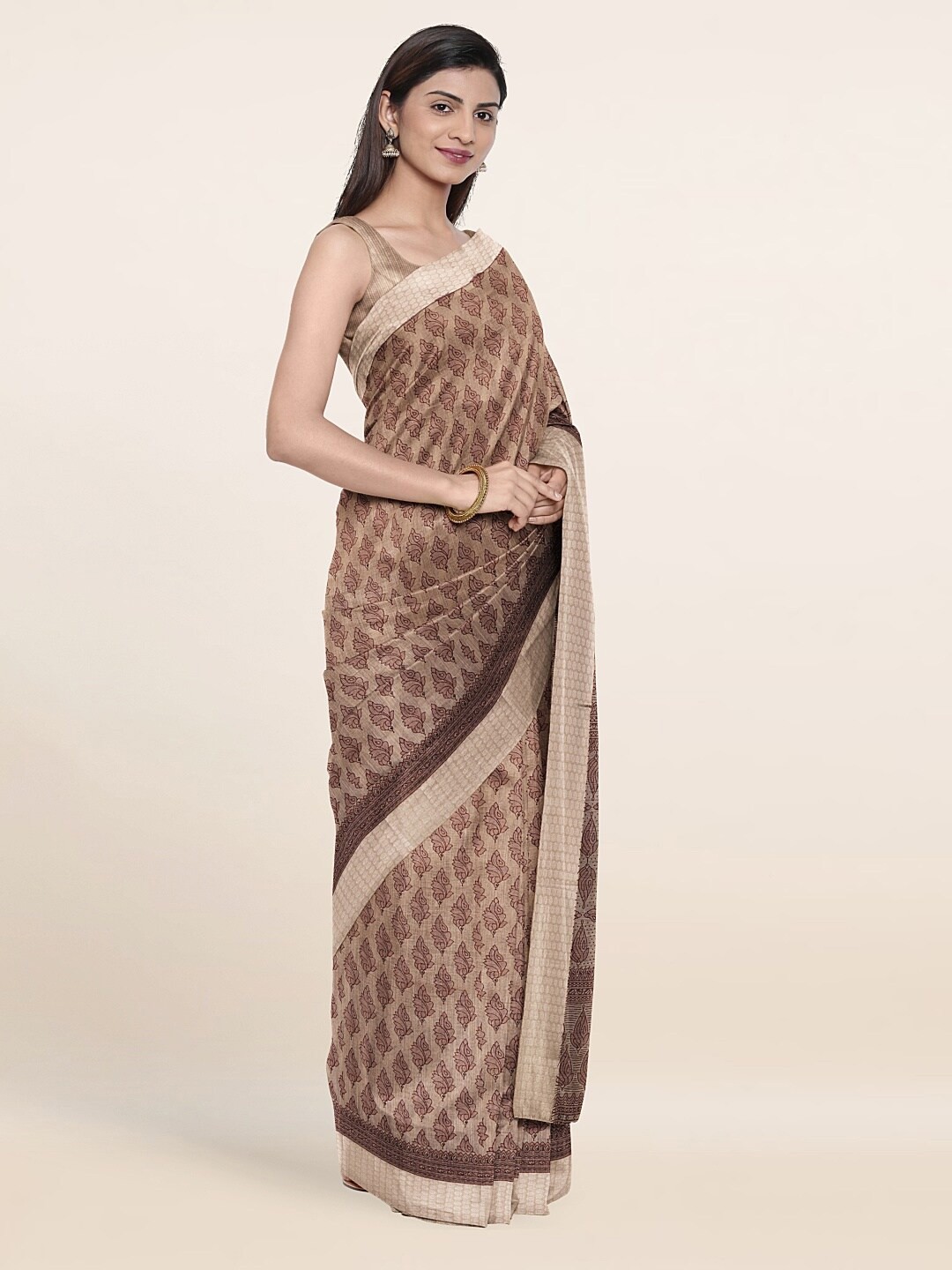 

Pothys Tan Floral Saree