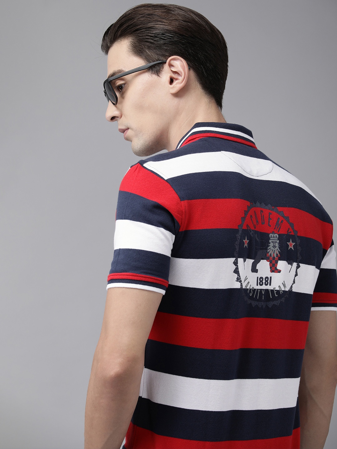 

Van Heusen ACADEMY Men Navy Blue & Red Striped Polo Collar Pure Cotton Slim Fit T-shirt