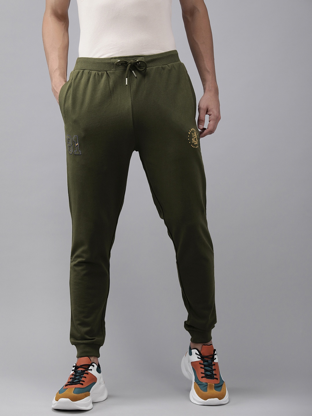 

Van Heusen ACADEMY Men Olive Green Brand Logo Printed Slim Fit Pure Cotton Regular Joggers