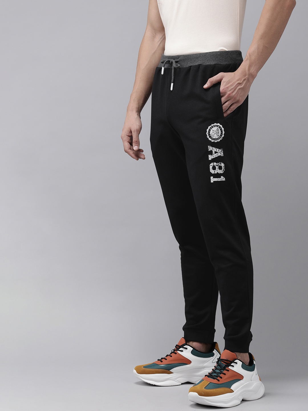 

Van Heusen ACADEMY Men Black Brand Logo Printed Slim Fit Pure Cotton Regular Joggers