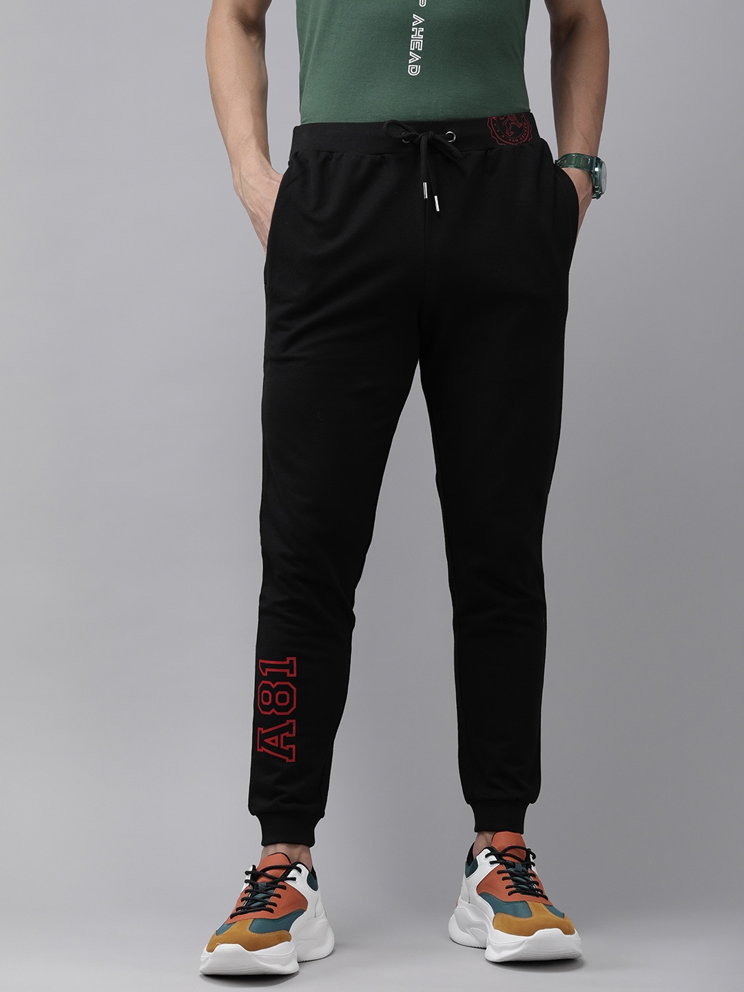 

Van Heusen ACADEMY Men Black Solid Pure Cotton Joggers