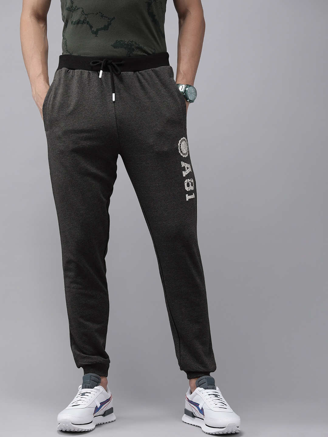

Van Heusen ACADEMY Men Charcoal Grey Brand Logo Printed Slim Fit Regular Joggers