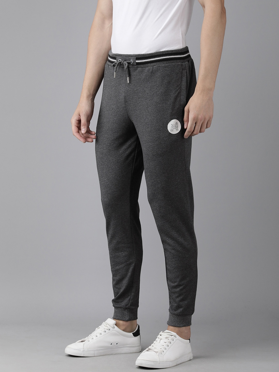 

Van Heusen ACADEMY Men Charcoal Grey Solid Slim Fit Joggers