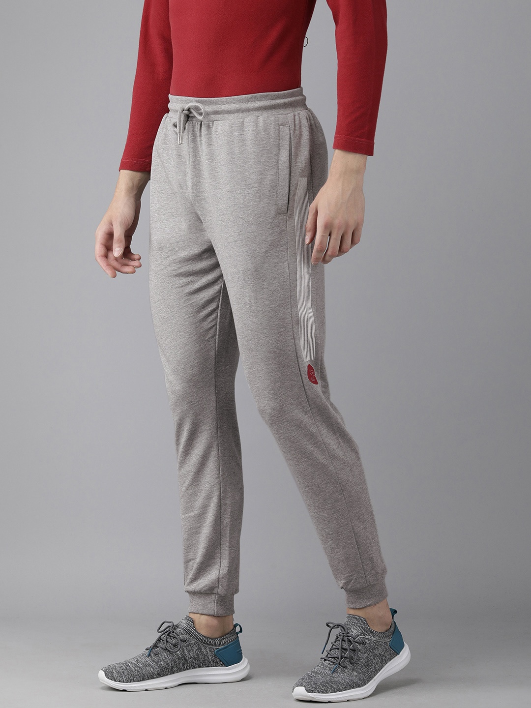 

Van Heusen ACADEMY Men Light Grey Solid Slim Fit Regular Joggers