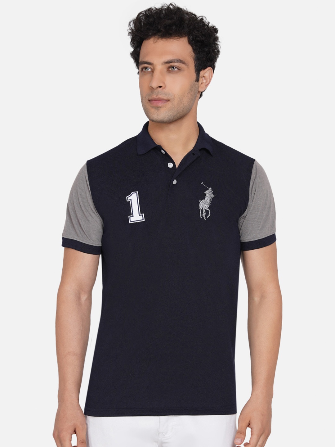 

Dais Men Navy Blue Colourblocked Polo Collar T-shirt