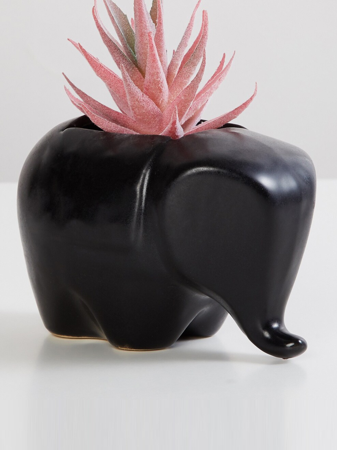 

Home Centre Black Textured Corsica Eden Elephant Ceramic Planter