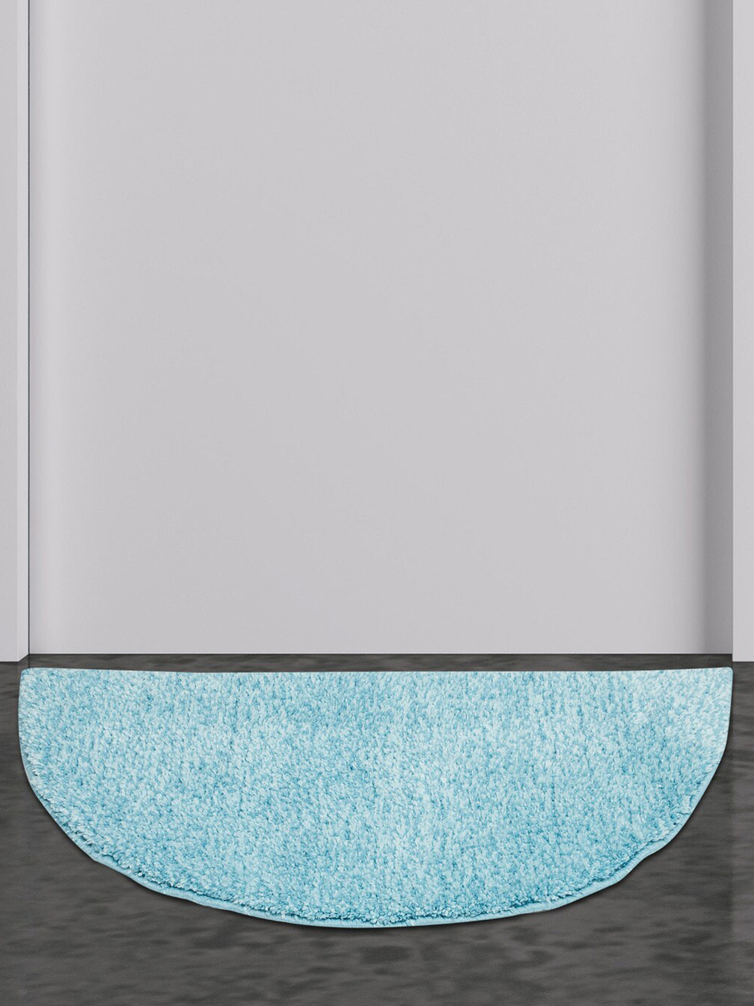 

Home Centre Blue Half Moon Shaped Floor Mats & Dhurries