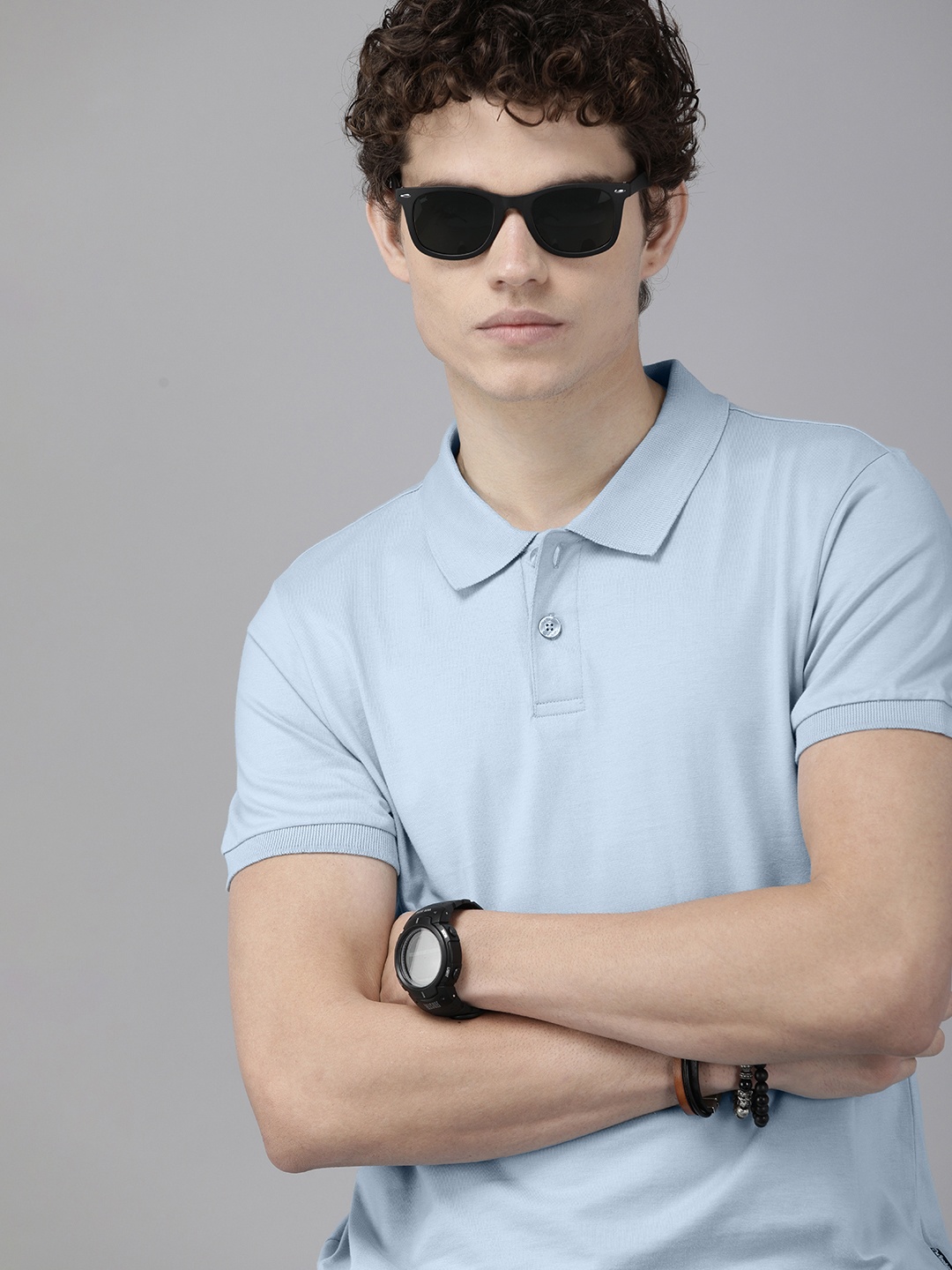

The Roadster Lifestyle Co. Men Blue Solid Polo Collar Pure Cotton T-shirt