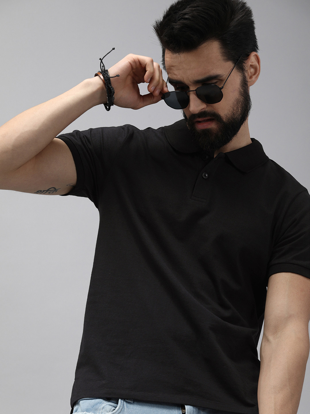 

Roadster Men Black Polo Collar Pure Cotton T-shirt