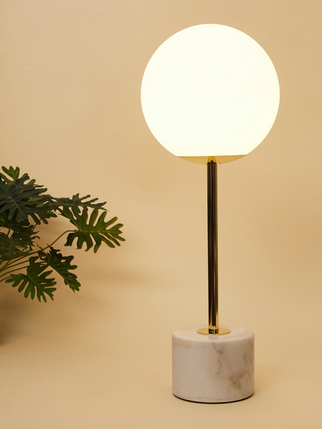 

Home Centre White Fiesta Spherical Marble And Glass Table Lamp