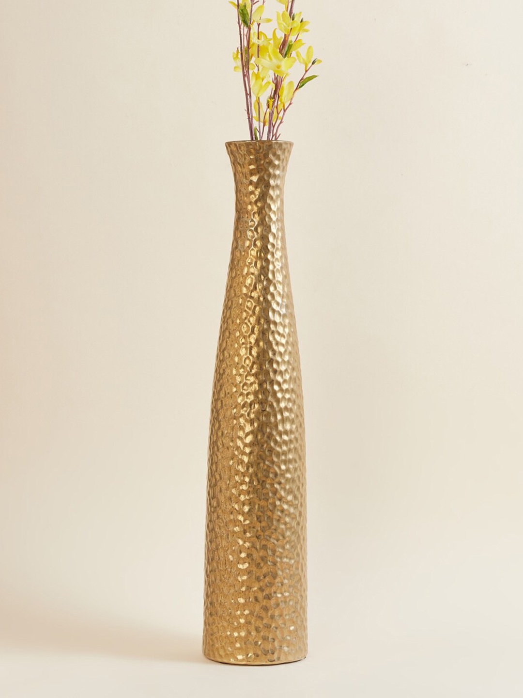 

Home Centre Gold Textured Round Ceramic Vase