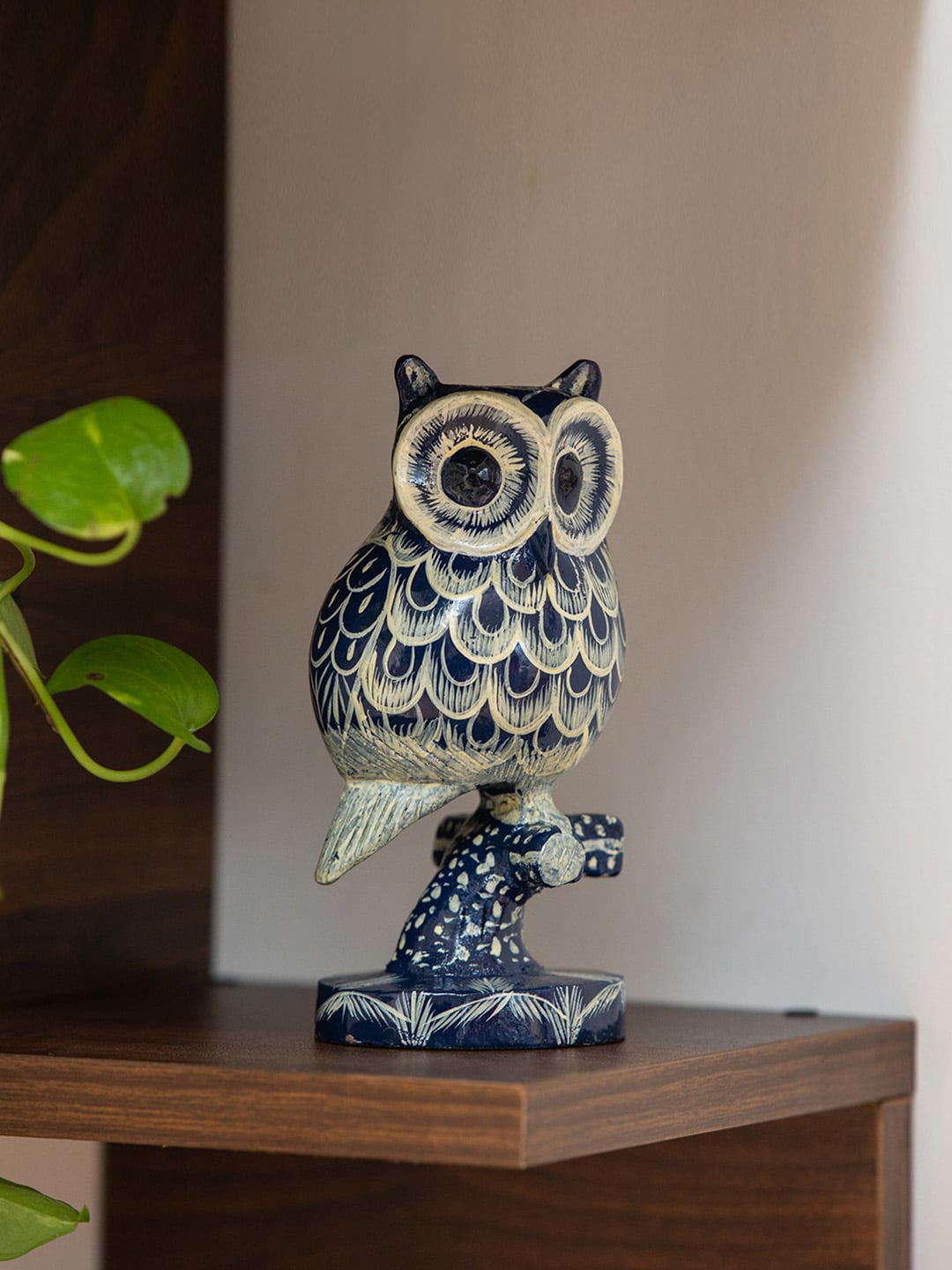 

ExclusiveLane Navy-Blue & Off-White Hand-Painted Wooden The Conscious Owl Showpieces