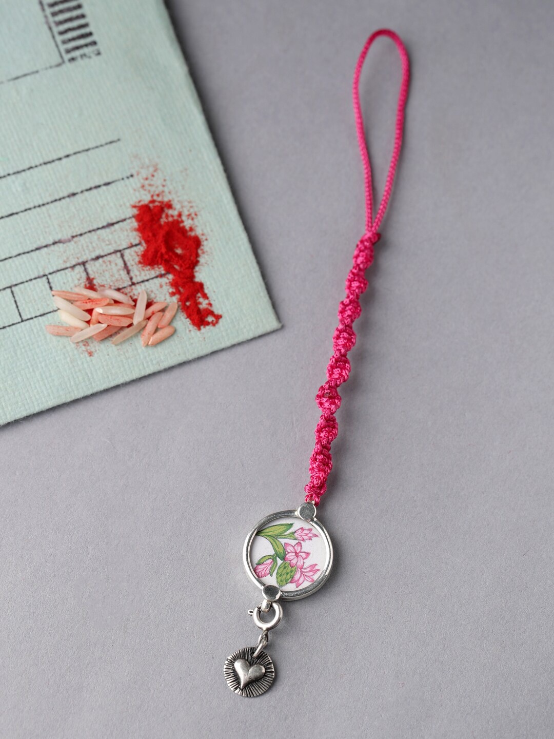 

ADORN by Nikita Ladiwala 92.5 Sterling Silver-Toned & Pink Floral Rakhi With Roli Chawal