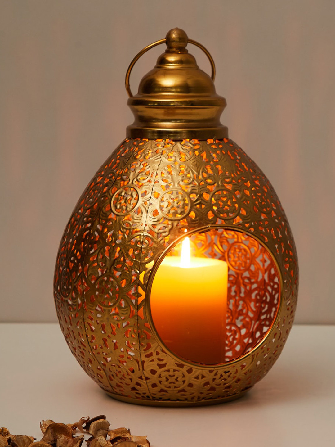 

Home Centre Gold-Tonned Metal Tea Light Candle Holder