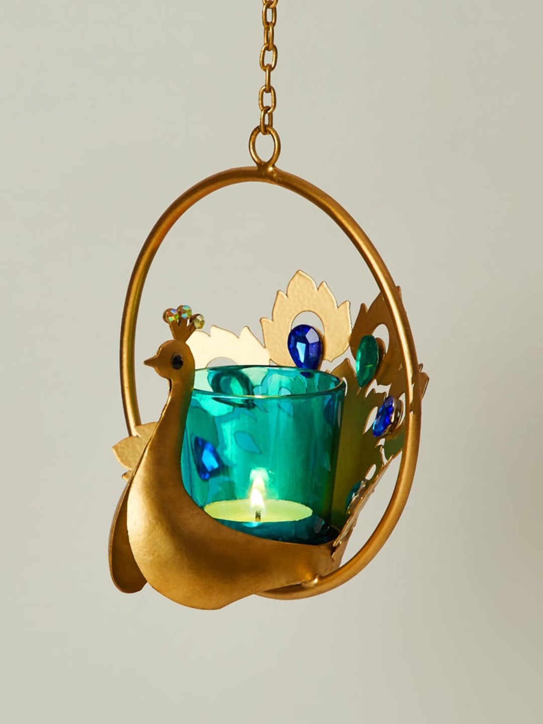 

Home Centre Gold Toned & Blue Peacock Shaped Glass Hanging T-lite Holder