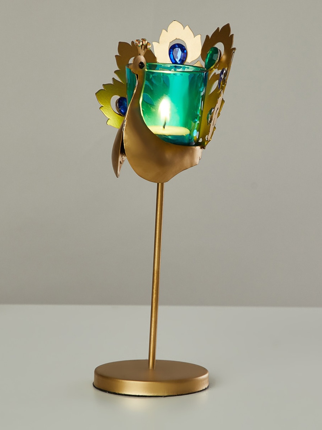 

Home Centre Gold & Blue Peacock Candle Holder