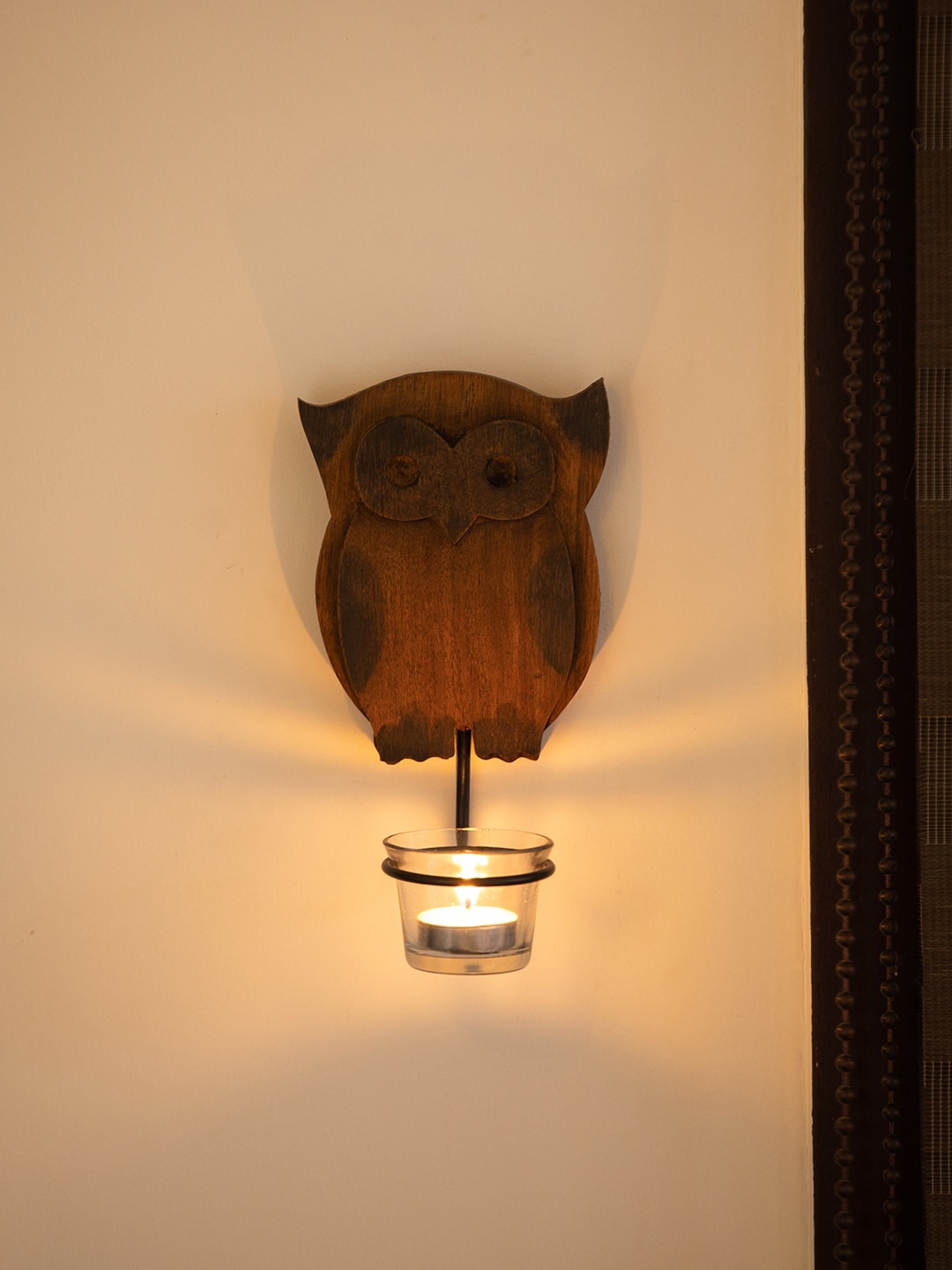 

ExclusiveLane Brown Hand Carved Wooden Wall Candle Holder (7.5 Inch)