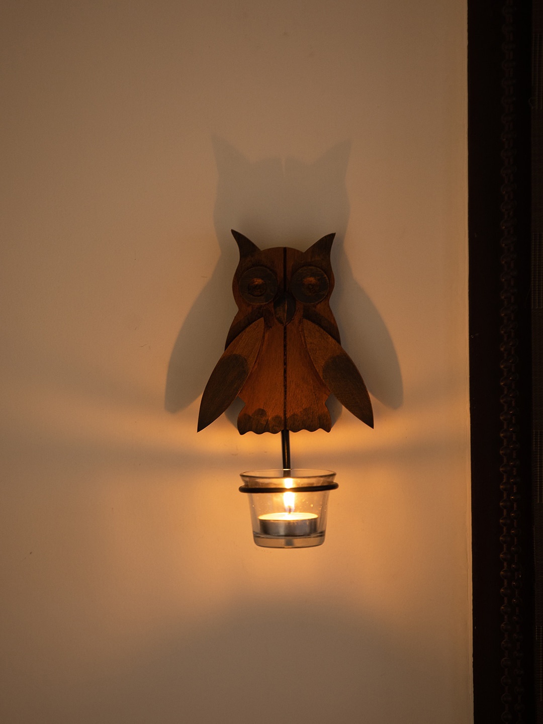 

ExclusiveLane Brown Transparent Hand Carved Wooden Wall Tea-Light Candle Holder