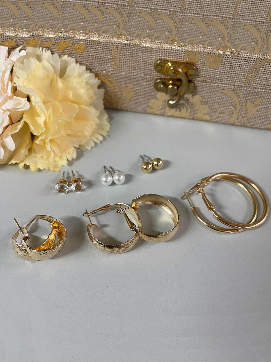 

Ishhaara Women Gold-Toned Circular Studs Earrings