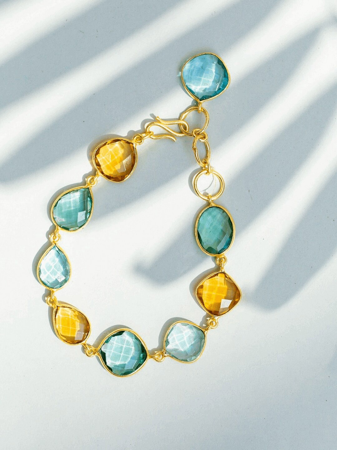 

Ishhaara Women Green & Orange Dawn to Dusk Sparkler Bracelet