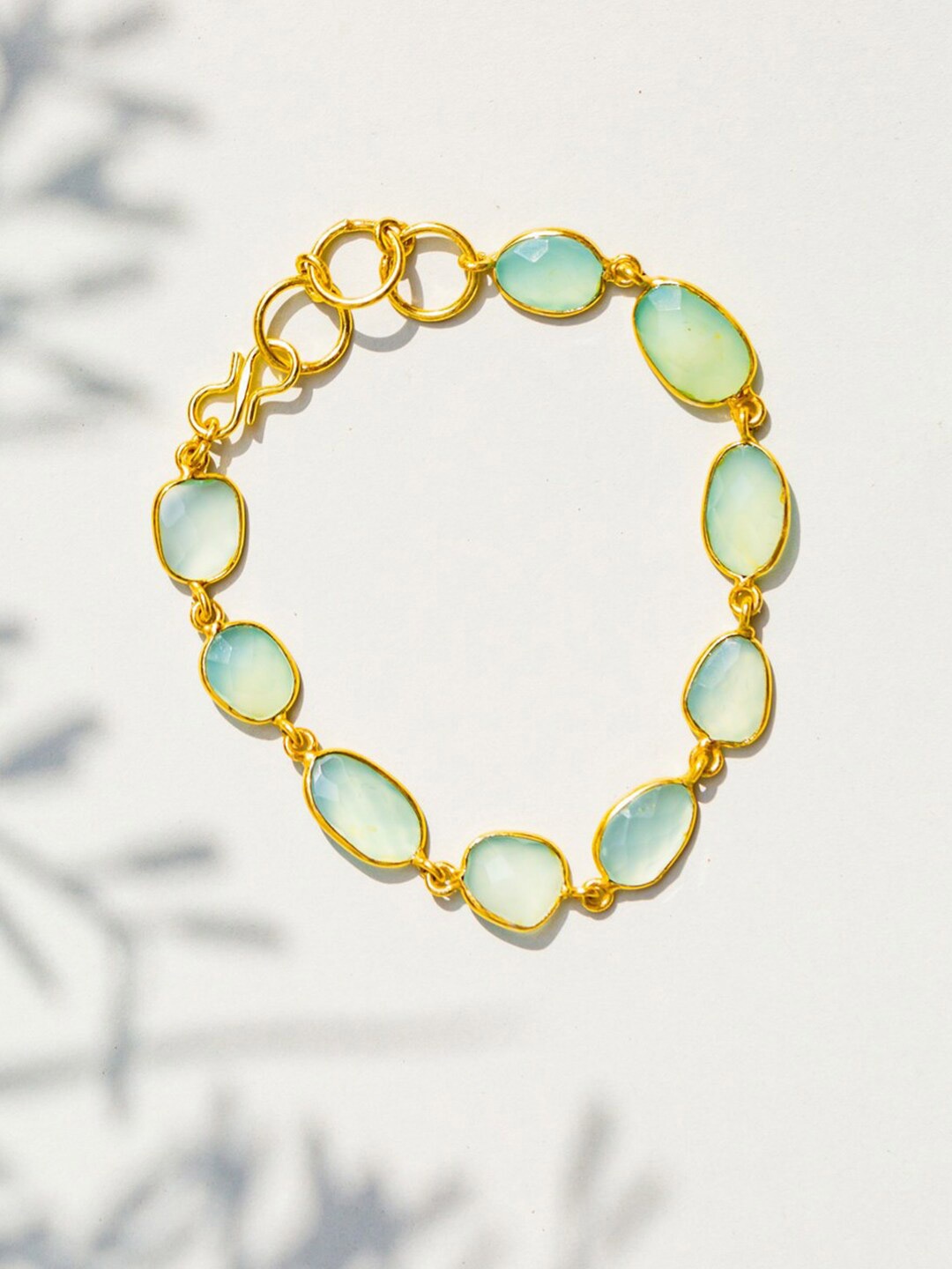 

Ishhaara Women Gold-Toned & Blue Carribean Sparkler Bracelet