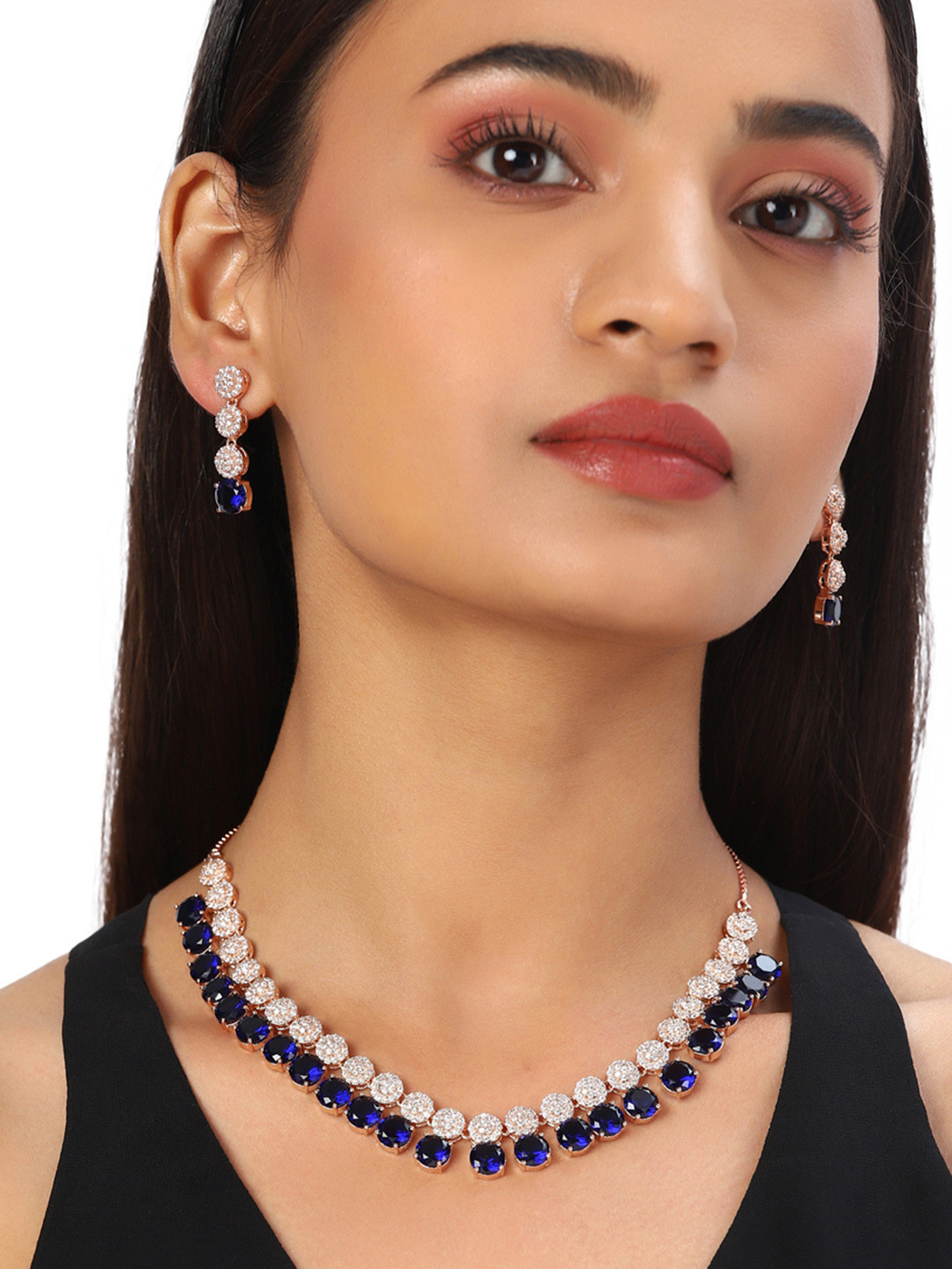 

Voylla Rose Gold Plated American Diamond CZ Necklace Set with Blue Stone