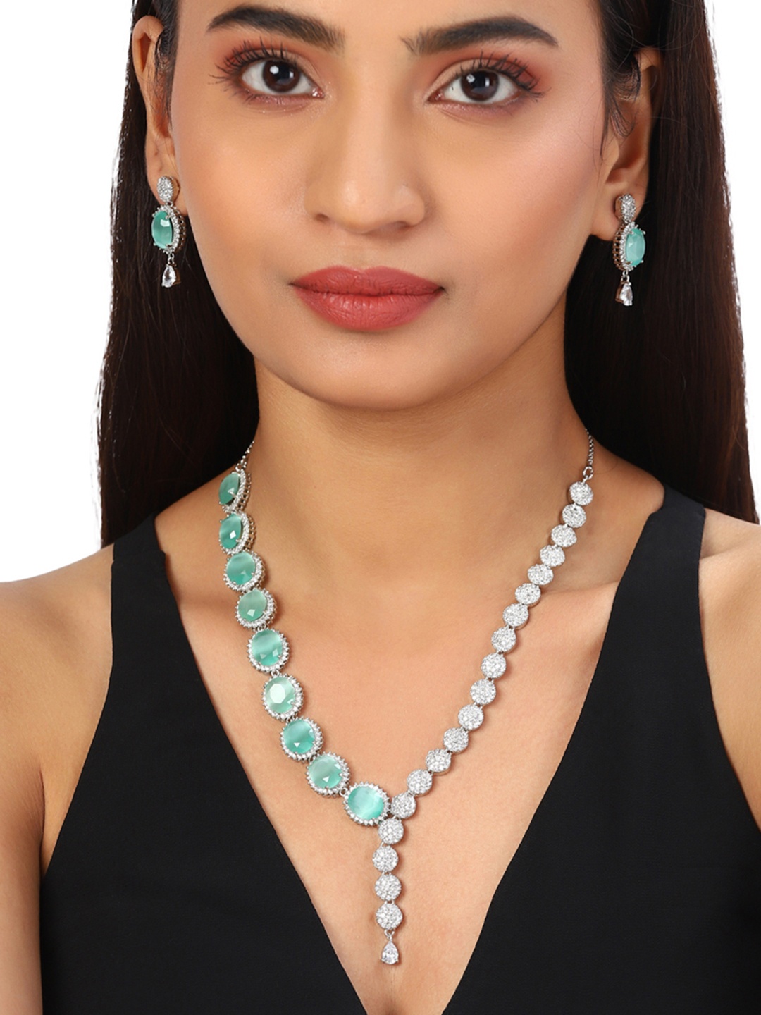 

Voylla White Silver Plated AD CZ Enamelled Necklace Set with Blue Stone